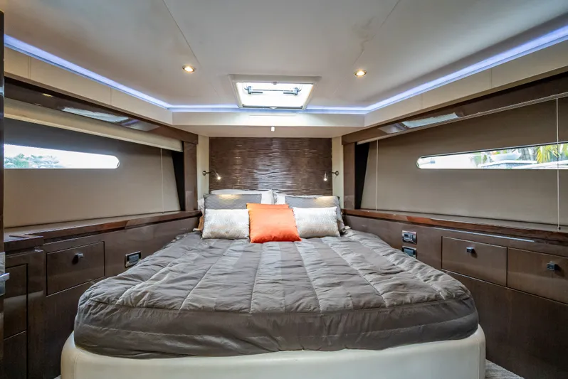 Pier Pressure Yacht Photos Pics Luxurious bedroom in the 2017 Carver C52 Coupe yacht.