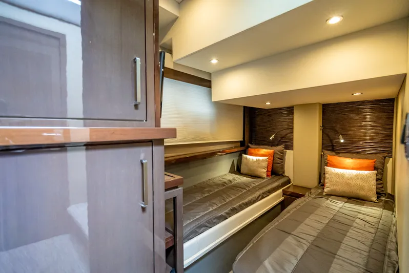 Pier Pressure Yacht Photos Pics Interior of 2017 Carver C52 Coupe with twin beds.