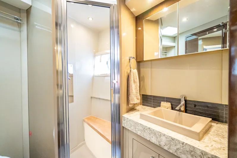Pier Pressure Yacht Photos Pics Luxurious bathroom in Carver C52 Coupe 2017 yacht.