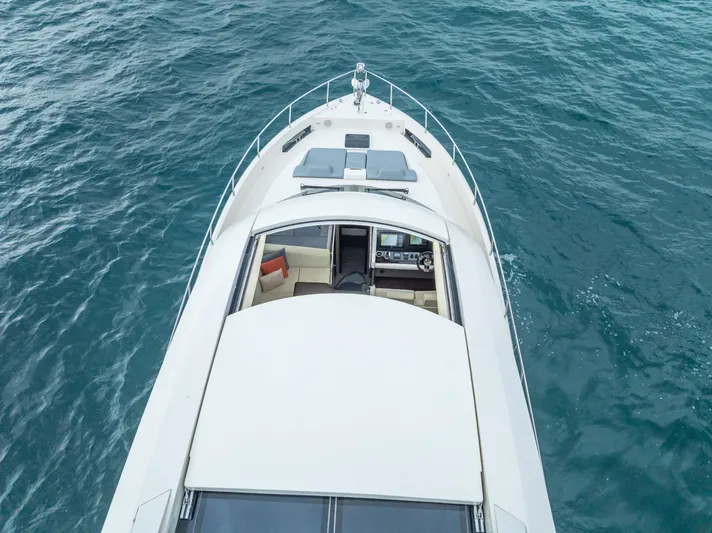 Pier Pressure Yacht Photos Pics Aerial view of 2017 Carver C52 Coupe yacht on the sea.