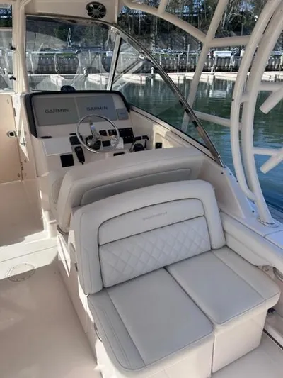  Yacht Photos Pics 2019 Grady-White Freedom 325 boat interior with Garmin navigation system.