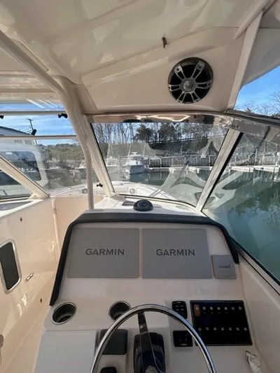  Yacht Photos Pics 2019 Grady-White Freedom 325 boat cockpit with Garmin navigation system