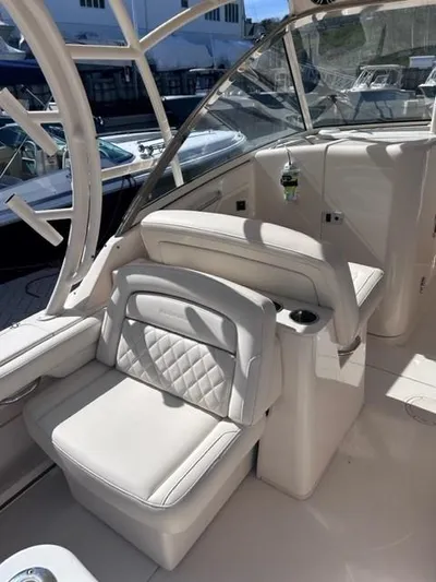  Yacht Photos Pics 2019 Grady-White Freedom 325 boat interior with white leather seating.