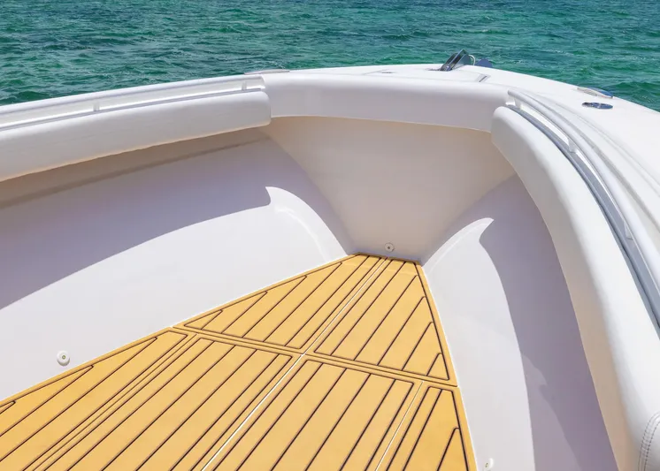  Yacht Photos Pics Bow of 2021 HCB 53 Sueños boat with teak flooring and ocean view.