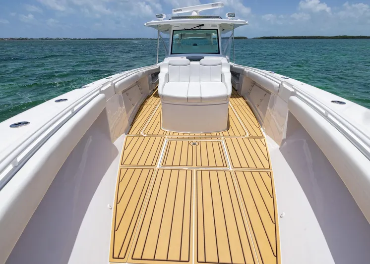  Yacht Photos Pics 2021 HCB 53 Sueños boat with spacious deck and seating on open water.