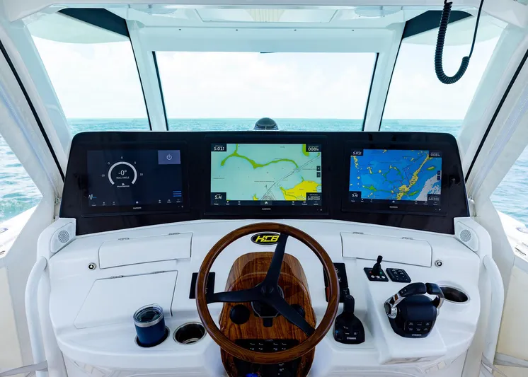  Yacht Photos Pics Helm of 2021 HCB 53 Sueños with advanced navigation displays and controls.