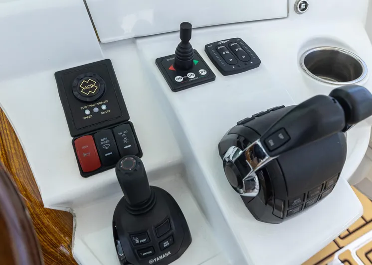  Yacht Photos Pics Control panel of 2021 HCB 53 Sueños boat with joystick and throttle controls.