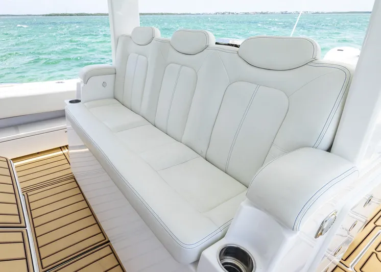  Yacht Photos Pics Luxurious white seating on 2021 HCB 53 Sueños boat with ocean view.