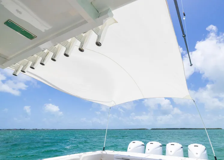  Yacht Photos Pics Luxury HCB 53 Sueños boat with canopy, ocean view, and clear blue sky, 2021 model.