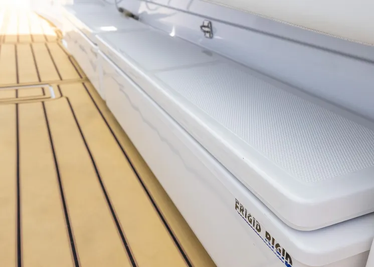  Yacht Photos Pics Deck view of 2021 HCB 53 Sueños with Frigid Rigid cooler.