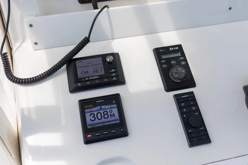 Yacht Photos Pics Control panel of 2020 Invincible 39 Open Fisherman with JL Audio and Garmin displays.