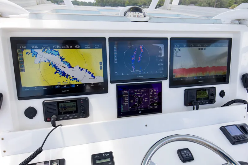  Yacht Photos Pics 2020 Invincible 39 Open Fisherman dashboard with advanced Garmin navigation displays.