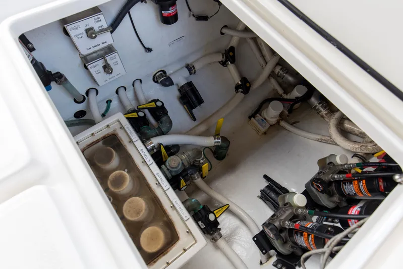  Yacht Photos Pics 2020 Invincible 39 Open Fisherman boat interior showing plumbing and mechanical components.