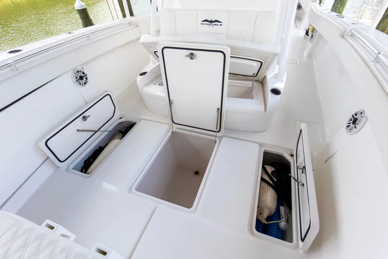  Yacht Photos Pics 2020 Invincible 39 Open Fisherman boat interior with open storage compartments.