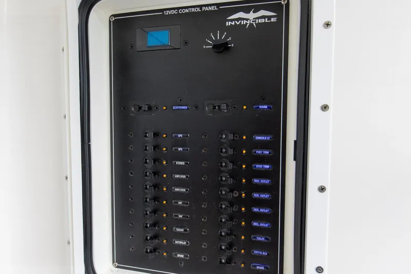  Yacht Photos Pics Control panel of 2020 Invincible 39 Open Fisherman boat, featuring various labeled switches.