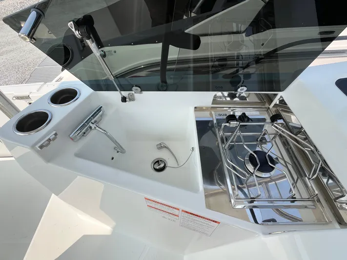  Yacht Photos Pics 2023 Beneteau Flyer 9 SUNdeck boat kitchen with sink and stove.