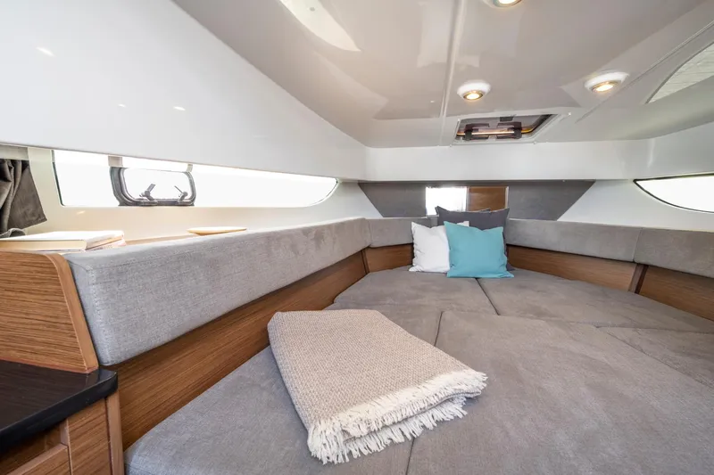  Yacht Photos Pics Interior cabin of 2023 Beneteau Flyer 9 SUNdeck with cozy seating and cushions.