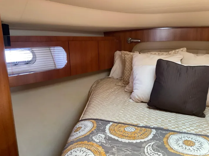 Cc Rider Yacht Photos Pics Luxurious cabin interior of 2004 Tiara Yachts 4400 Sovran with elegant bedding.