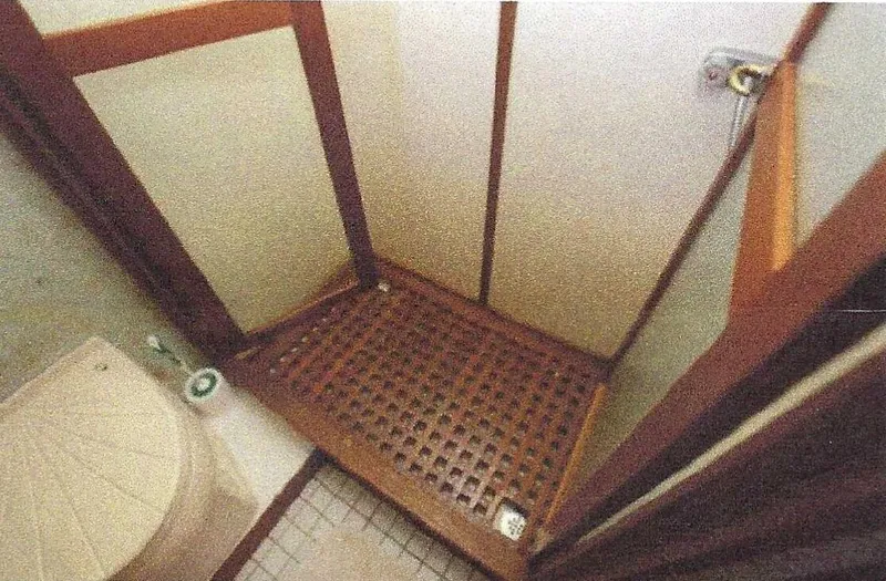 Wendy Lynn Yacht Photos Pics 1984 Ocean Alexander Flying Bridge Motor Yacht bathroom with wooden shower floor and toilet.
