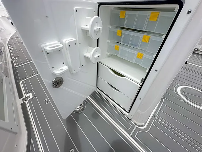  Yacht Photos Pics 2024 Sea Fox 328 Commander storage compartment with organized shelves and drawers.