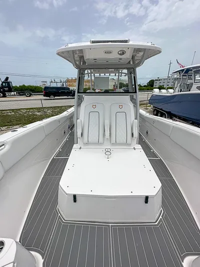  Yacht Photos Pics 2024 Sea Fox 328 Commander boat, spacious deck, modern design, white and gray color scheme.