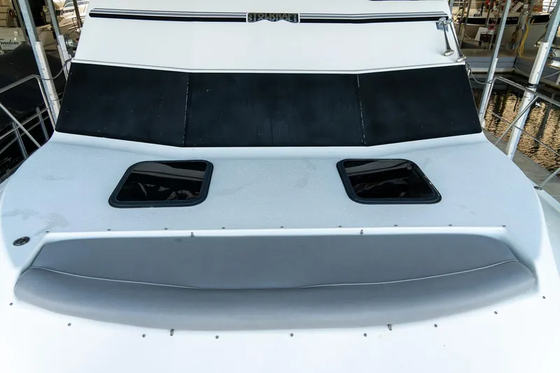 Jolly Roger II Yacht Photos Pics 1997 Harbor Master Stolkraft boat deck with windows and seating area.