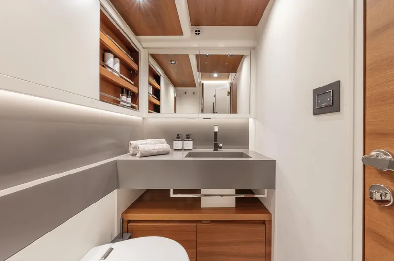 Dolce Vita Yacht Photos Pics Luxurious bathroom interior of 2024 Pardo Yachts Endurance 60, featuring modern design and wood accents.