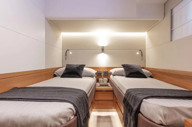 Dolce Vita Yacht Photos Pics Luxurious twin cabin interior of 2024 Pardo Yachts Endurance 60 with modern lighting.