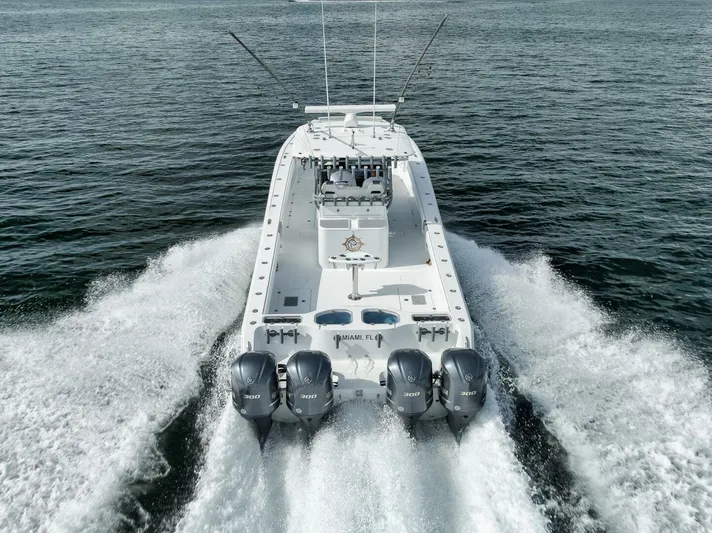 Due East Yacht Photos Pics 2017 Freeman 42LR boat cruising on open water with powerful engines.