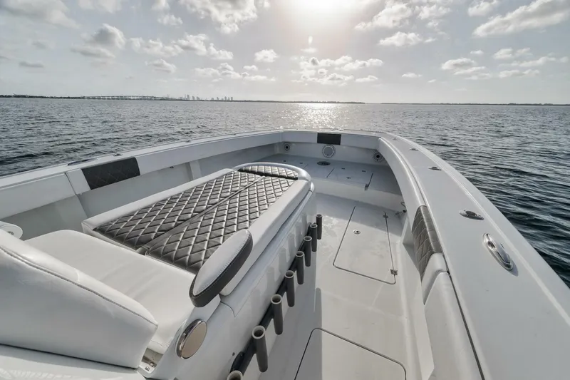 Due East Yacht Photos Pics Luxurious 2017 Freeman 42LR boat on open water, featuring spacious deck and seating.