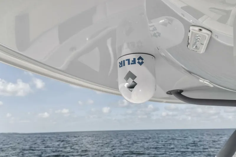 Due East Yacht Photos Pics FLIR camera mounted on a 2017 Freeman 42LR boat, overlooking the ocean.