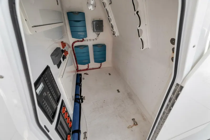 Due East Yacht Photos Pics Interior of a 2017 Freeman 42LR boat, featuring control panels and storage compartments.