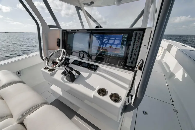 Due East Yacht Photos Pics Freeman 42LR 2017 boat cockpit with advanced navigation system and ocean view.