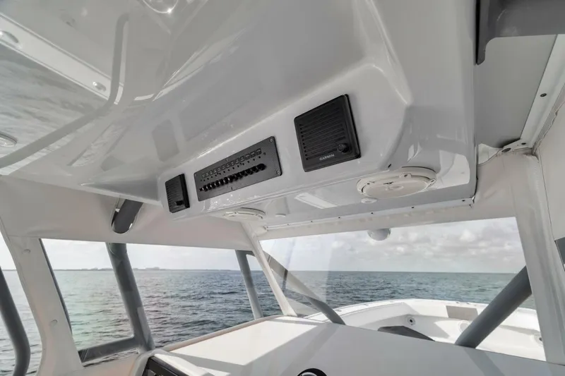Due East Yacht Photos Pics Interior view of 2017 Freeman 42LR boat with ocean backdrop.