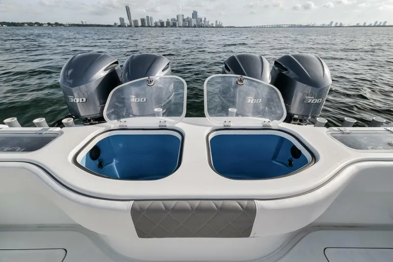 Due East Yacht Photos Pics Freeman 42LR 2017 boat with dual livewells and four 300 horsepower engines on open water.