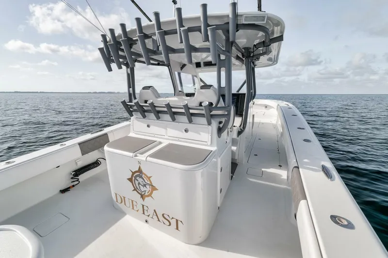 Due East Yacht Photos Pics 2017 Freeman 42LR boat on open water, featuring "DUE EAST" branding.