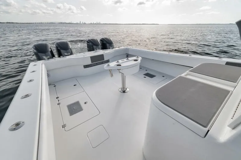 Due East Yacht Photos Pics Freeman 42LR 2017 boat deck with four engines, on open water.