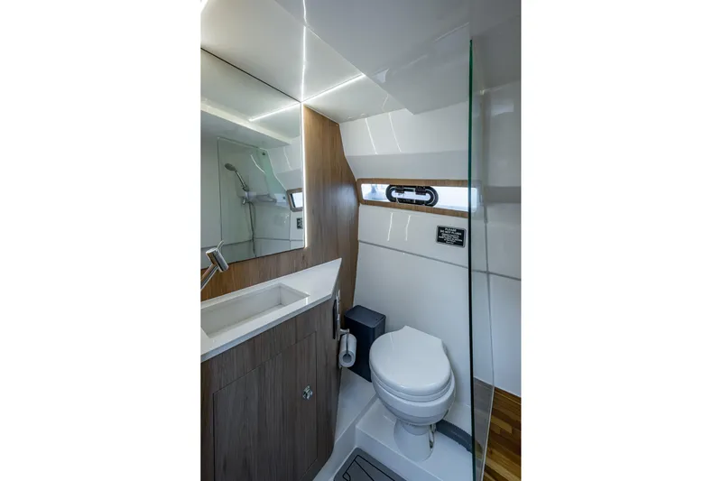 Xuru Yacht Photos Pics Modern bathroom interior in 2023 NX 340 model yacht, featuring sleek design and wood accents.