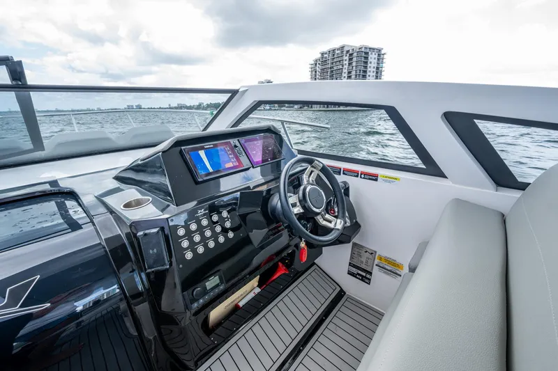 Xuru Yacht Photos Pics Modern NX 340 boat cockpit with advanced controls and navigation system, 2023 model.