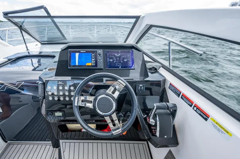 Xuru Yacht Photos Pics Cockpit of 2023 NX 340 boat with modern navigation and control systems.