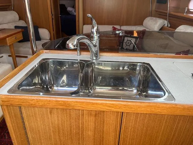 Rita Gale Yacht Photos Pics Stainless steel double sink in 2012 Catalina 355 yacht interior.