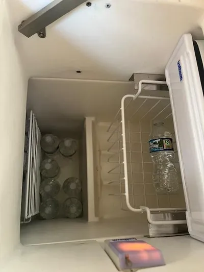 Rita Gale Yacht Photos Pics Refrigerator interior with water bottles, Catalina 355, 2012 model.