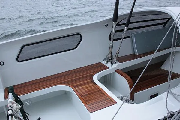 Vitalia II Yacht Photos Pics 2003 Multiplast High Performance Catamaran with sleek wooden deck and modern design.