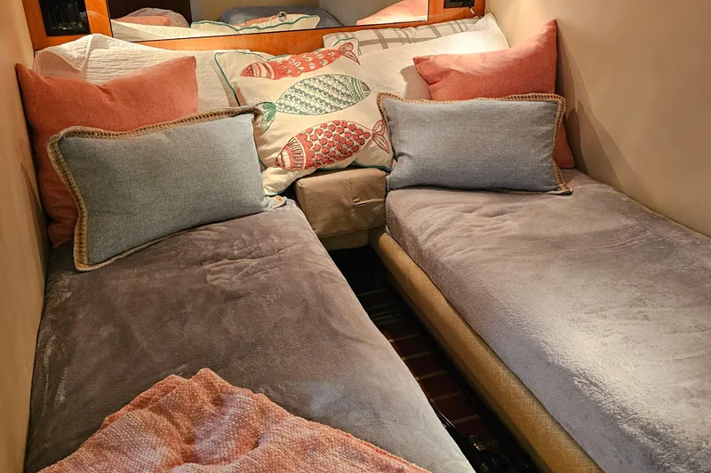  Yacht Photos Pics Cozy twin beds in 2005 Regal Commodore 4260 cabin with colorful pillows.