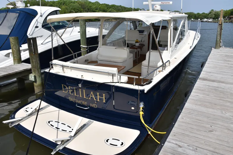 Delilah Yacht Photos Pics 2011 MJM 40z Downeast boat docked, rear view, named Delilah from Baltimore, MD.