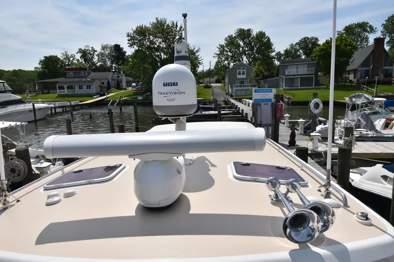 Delilah Yacht Photos Pics 2011 MJM 40z Downeast boat docked at a marina with radar and horn.