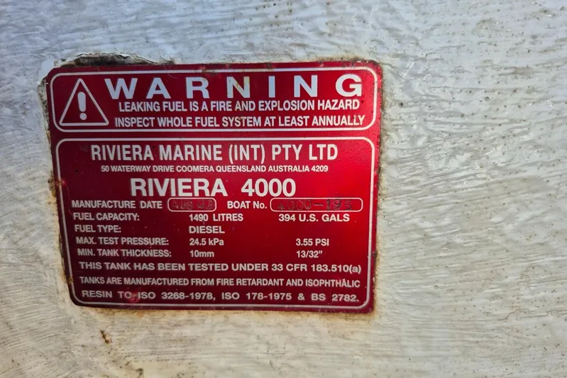  Yacht Photos Pics Warning label on a 2004 Riviera 4000 Offshore boat, detailing fuel system specifications.
