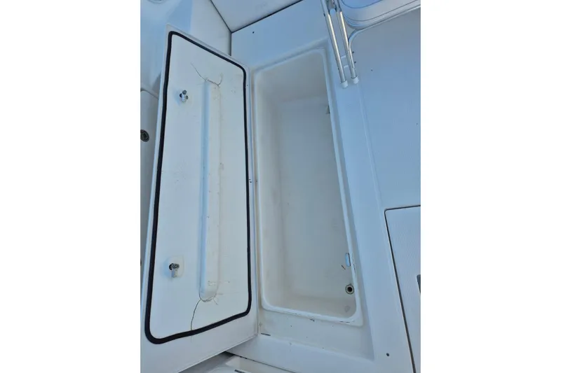  Yacht Photos Pics Open storage compartment on a 2004 Riviera 4000 Offshore boat.