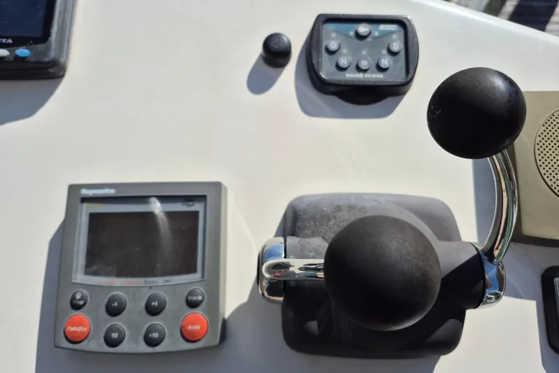  Yacht Photos Pics Control panel of a 2004 Riviera 4000 Offshore boat with navigation equipment.