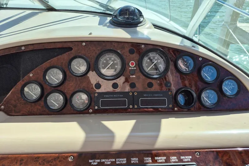  Yacht Photos Pics Dashboard of a 2004 Riviera 4000 Offshore boat with gauges and controls.